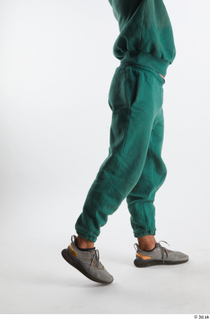 Nathaniel  1 dressed flexing green jogging pants grey sneakers…